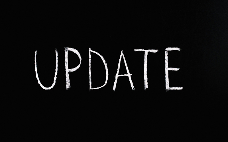 Palavra "Update" escrita a branco sobre fundo preto para ilustrar a nova atualização do Google sobre os títulos das página e descrições das página dos websites